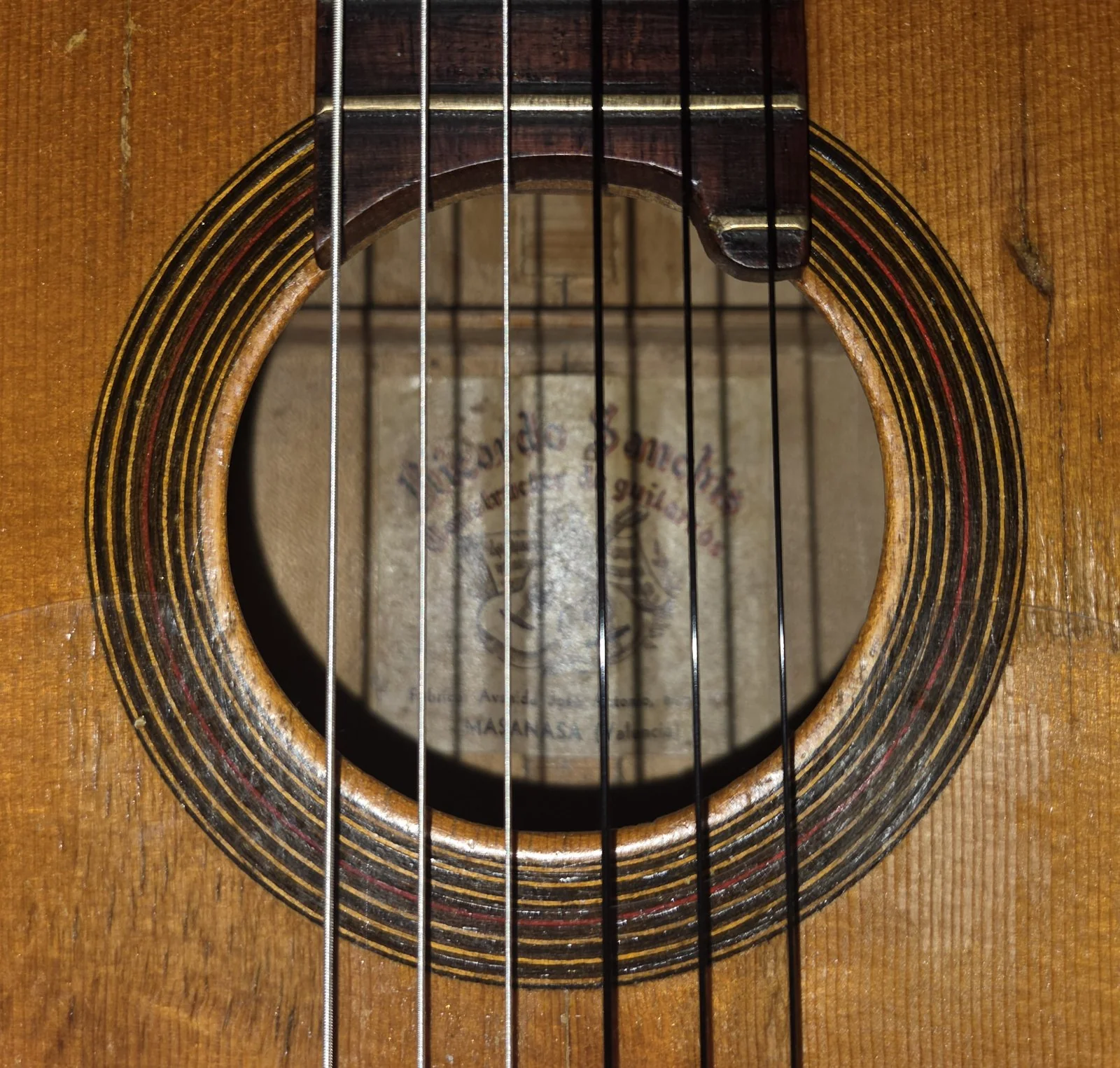 El Abuelo · rosette and Ricardo Sanchis label detail