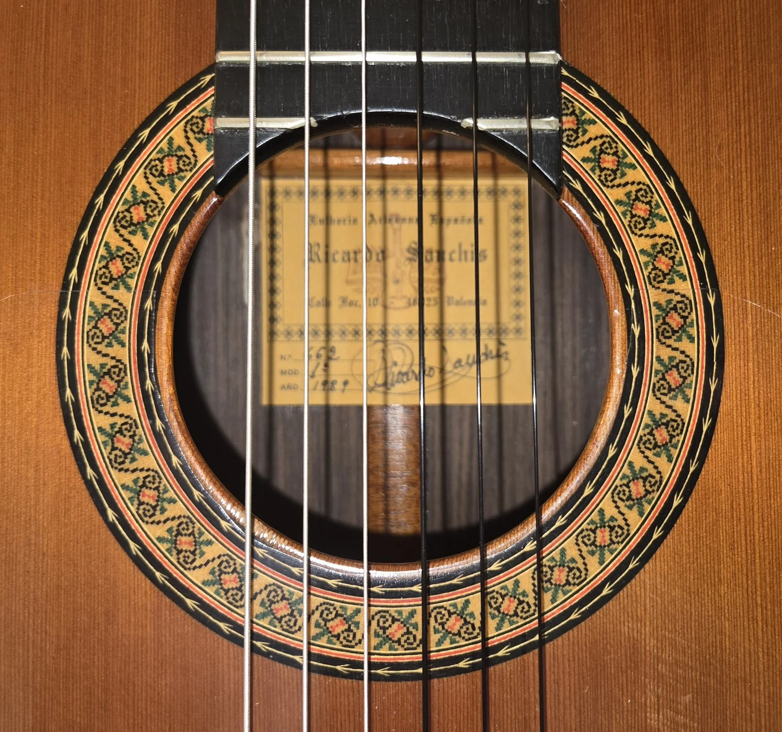 El Nieto · rosette and Ricardo Sanchis label detail
